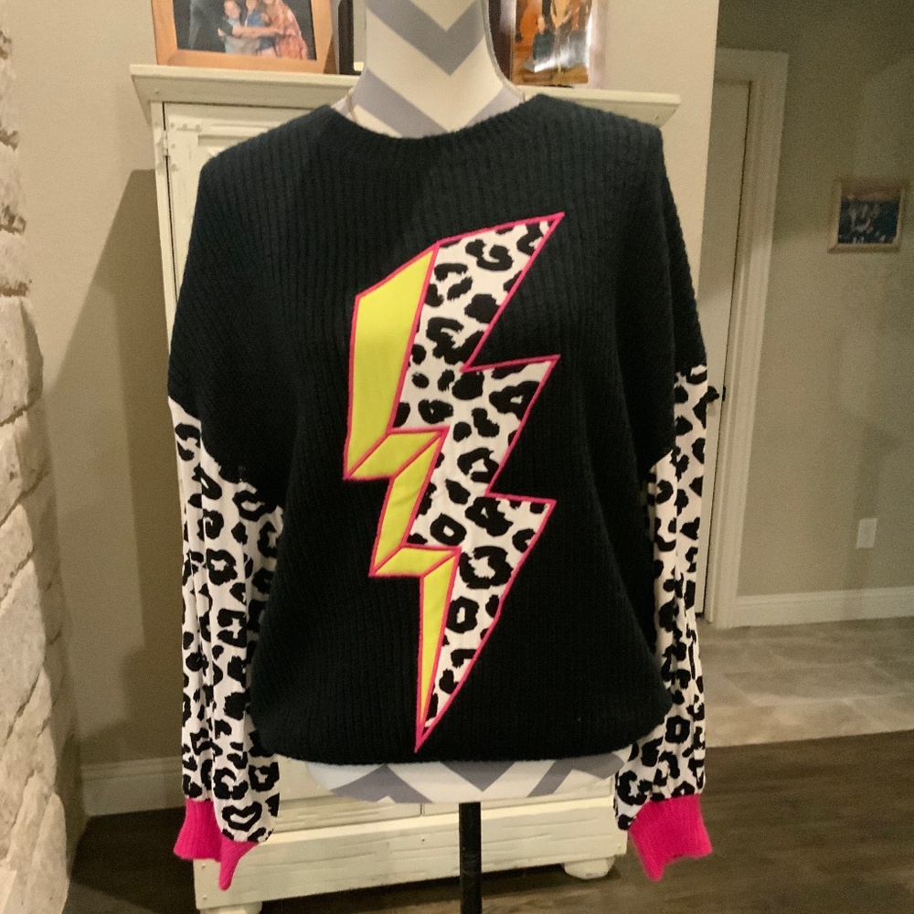 Crazy Train lightning bolt sweater.